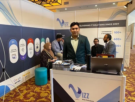 Vizz Web Solutions booth at international tech event showcasing software and IT services